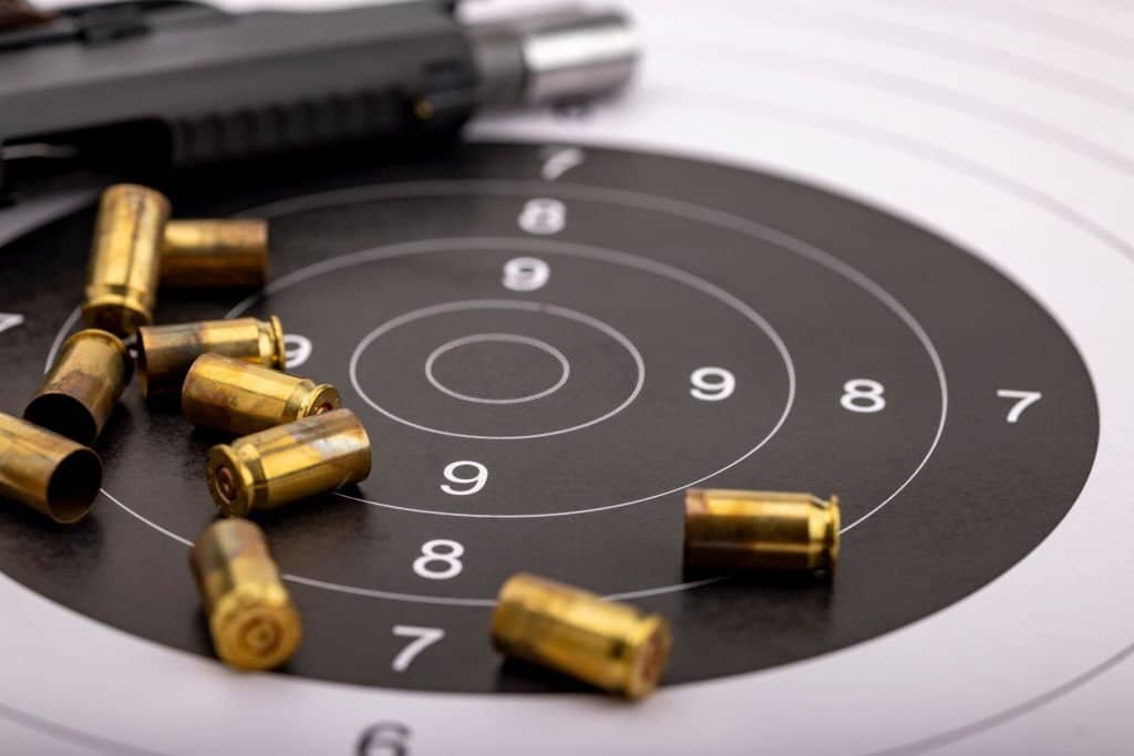 Handgun and Ammunition laying on a target - Online Texas LTC - Concealed Carry Handgun License - San Antonio Texas